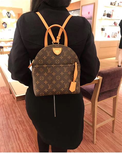 lv backpack 1 1 quality replic